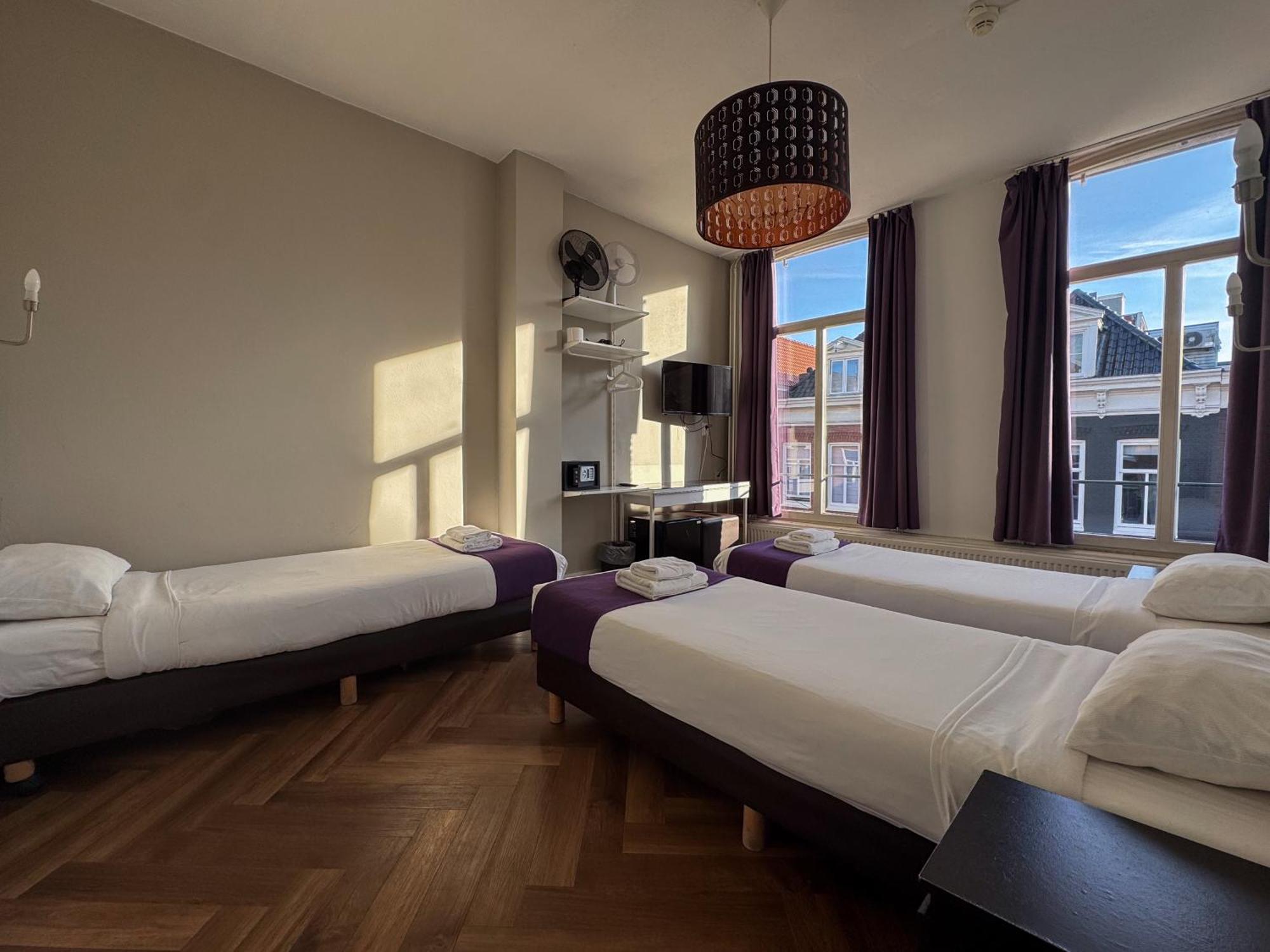 Economy Triple Room with Shared Bathroom